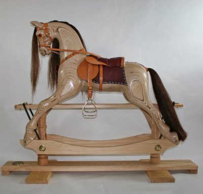 Medium_laminated_rocking_horse__04672_hand-carved-horses_medium-rocky-laminated-rocking-horse.jpg
